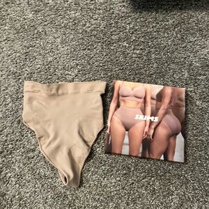 SKIMS sculpting mid waist thong